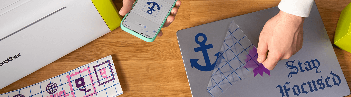 Artspira, Import your own designs and transfer wirelessly, photo showing phone connecting to sewing machine